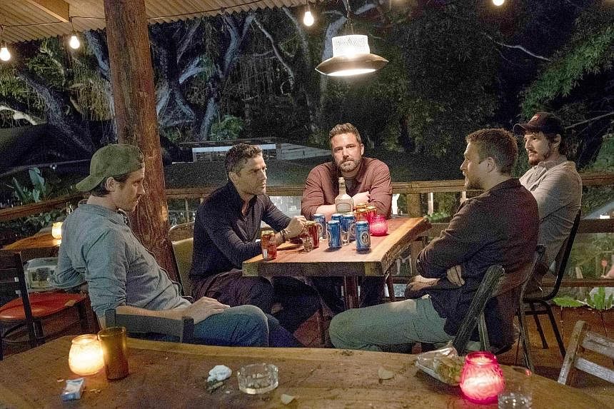Triple Frontier stars (above from left) Garrett Hedlund, Oscar Isaac, Ben Affleck, Charlie Hunnam and Pedro Pascal.