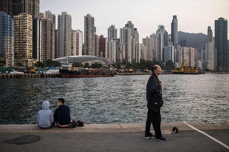 Hong Kong leader Carrie Lam said participation in the bay area will not weaken Hong Kong's independent tariff status. The Pearl River in Guangzhou, Guangdong province, China. Under the plan unveiled last month, Hong Kong and Macau will be linked clos