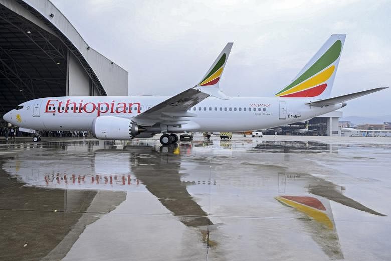 Above: An Ethiopian Airlines Boeing 737 Max 8 plane, the same type of aircraft that crashed on Sunday after leaving Addis Ababa, killing all 157 people on board.