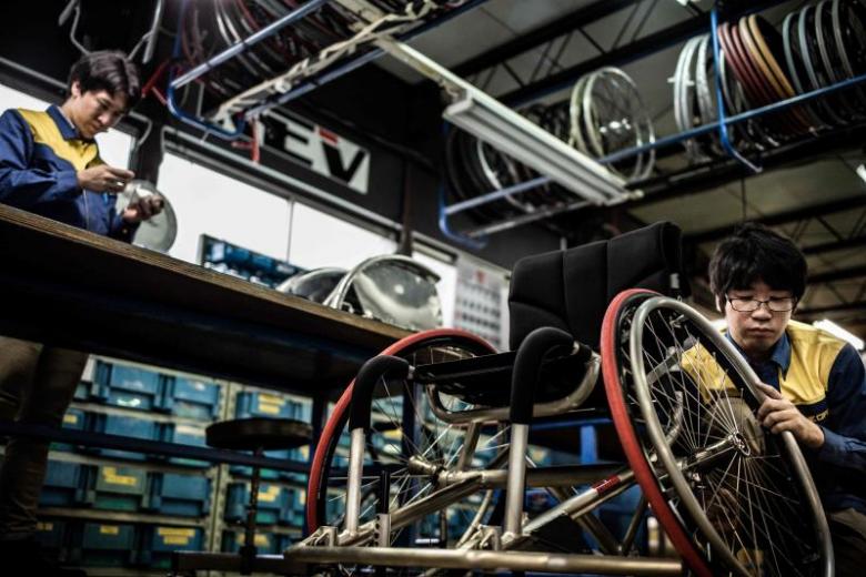 Paralympic fast track? Japanese firm develops hitech wheelchairs The