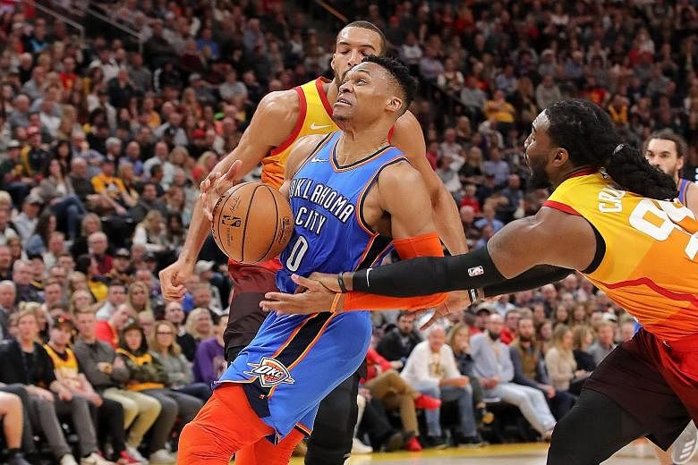 Oklahoma City Thunder's Russell Westbrook had 23 points in the 98-89 NBA win over the Jazz on Monday night, but his celebrations were marred by a bust-up with a Utah supporter.