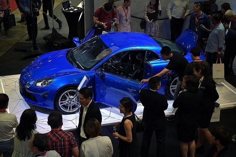 The Singapore Motorshow in January helped boost car sales for the month, up 20 per cent from last year, noted SingStat.