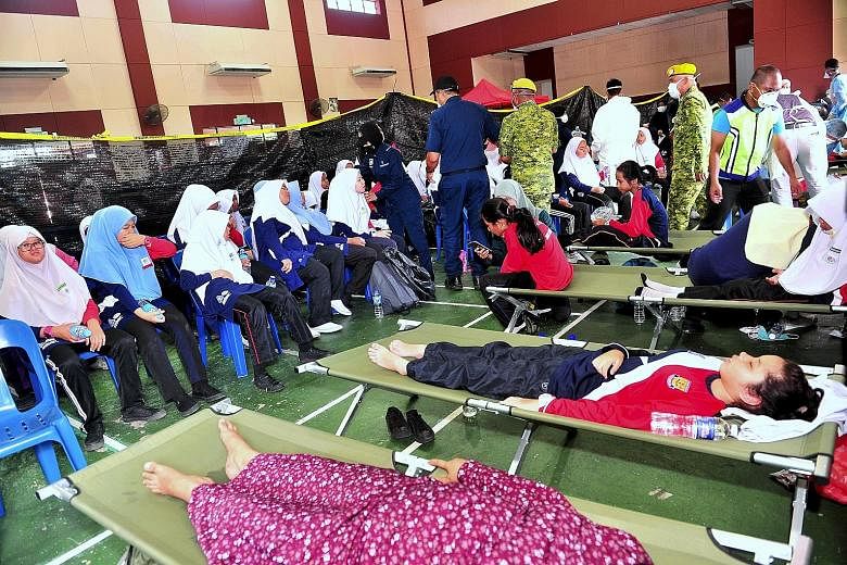 Students from two schools in the Pasir Gudang area were taken to Taman Pasir Putih Community Hall for treatment after experiencing breathing difficulties. The authorities said the chemical waste was discharged into Sungai Kim Kim, which flows into th