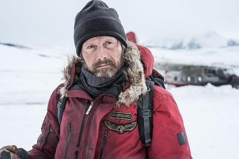 Overgard (played by Mads Mikkelsen) stays alive in Arctic with his survival skills.