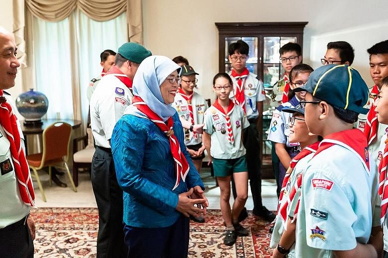President Halimah Yacob launched the annual Scout Job Week at the Istana Villa yesterday. The objective of Scout Job Week is to ingrain a hardworking spirit and teach scouts to appreciate the value of honest work.