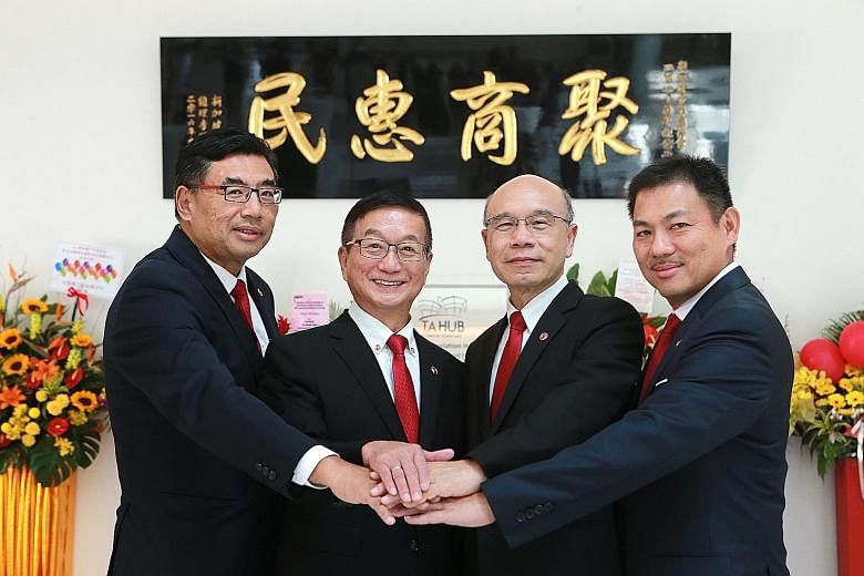 SCCCI president Roland Ng (second from left) with vice-presidents (from left) Mr Kuah Boon Wee, Mr Charles Ho Nai Chuen and Mr Pek Lian Guan. The chamber installed its 60th council yesterday, marking the start of Mr Ng's second term as president. His