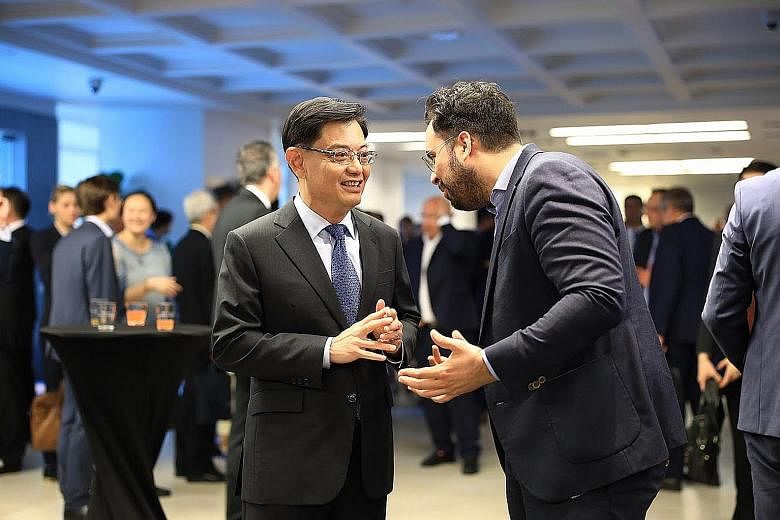 Finance Minister Heng Swee Keat with French Secretary of State for Digital Affairs Mounir Mahjoubi at the closing reception of the second Singapore-France Economic Forum yesterday. The new committee's work will involve research organisations, univers