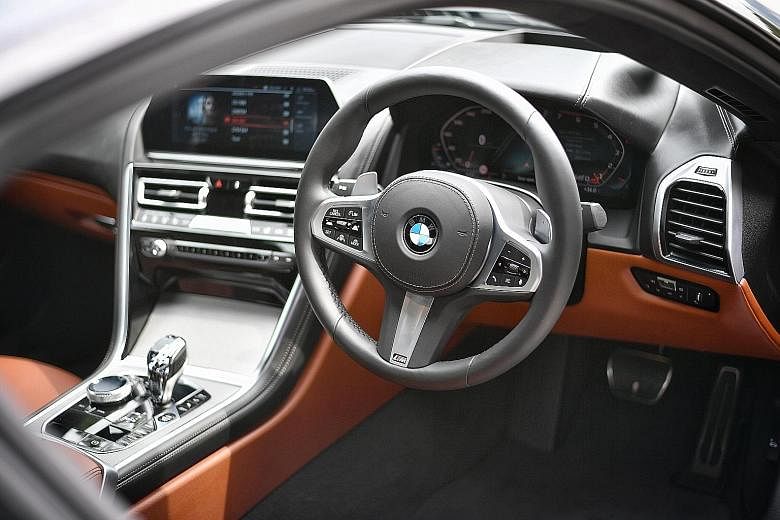 The interiors stand out with touches such as the application of glass on the top of the gear lever, iDrive rotary control and Start button, and metal file surfaces for the iDrive knob and air-conditioner louvres.