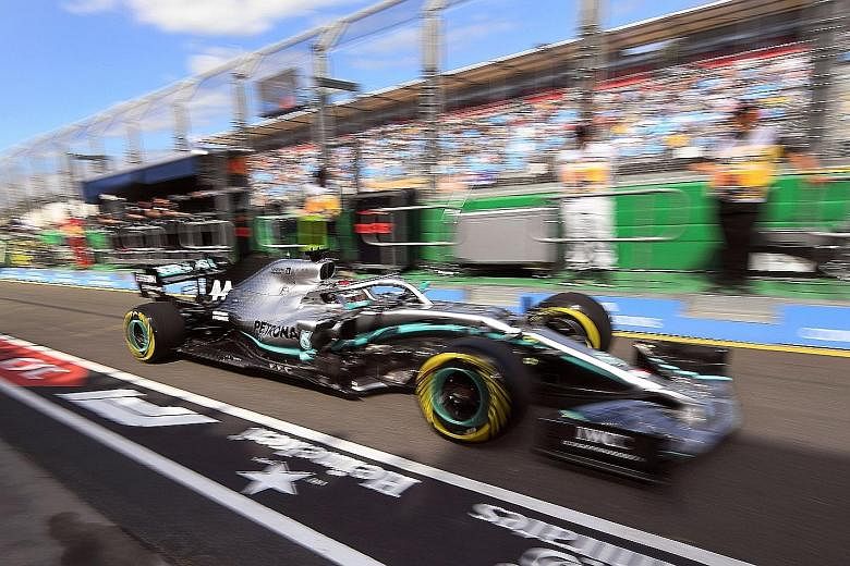 Mercedes' five-time world champion Lewis Hamilton making his way out of the pits during first practice at the Australian Grand Prix in Melbourne yesterday.