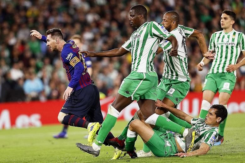 Real Betis defenders could not stop Lionel Messi from his scrumptious hat-trick in a 4-1 win, leaving Barcelona 10 points clear atop LaLiga.