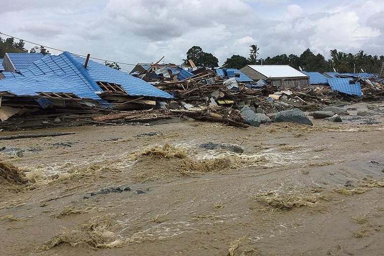 Flash floods last Saturday destroyed hundreds of houses and left vehicles submerged in mud in Sentani. Two bridges were washed away, as were large trees and even a light aircraft.