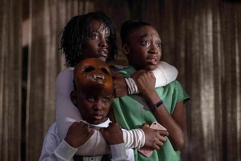 Us stars (clockwise from top) Lupita Nyong'o, Shahadi Wright Joseph and Evan Alex, who play a family terrorised by their doppelgangers.