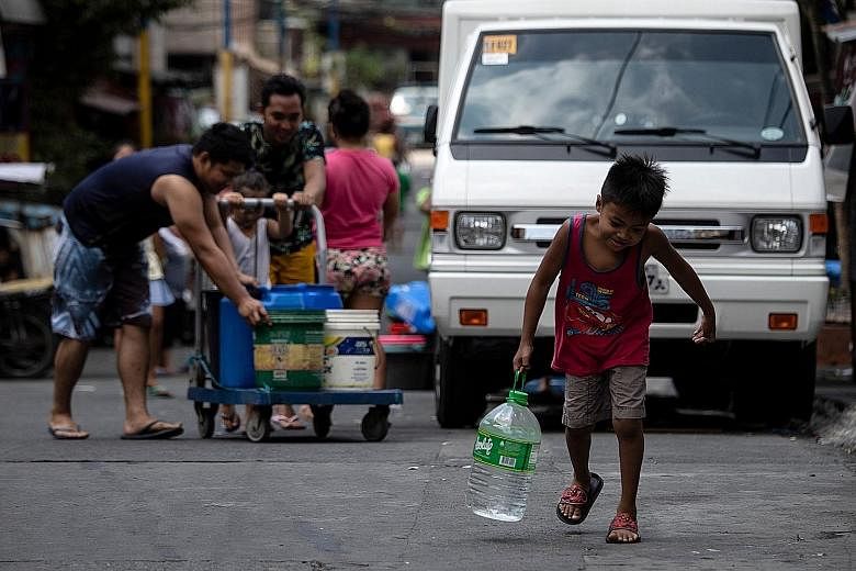 Metropolitan Manila has been hit by a water crisis, with families forced to wait for hours to get supplies from tanker trucks.