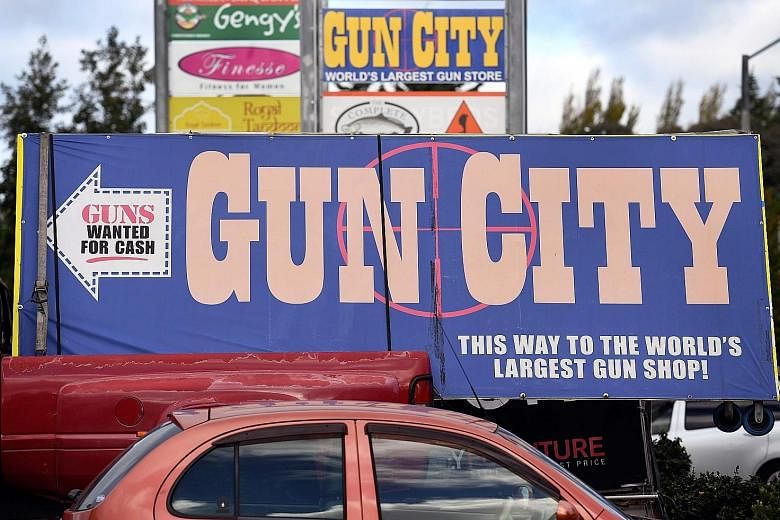 A sign for a Christchurch gun shop. Following the massacre of 50 people at two mosques in the city last week, the New Zealand Cabinet has agreed in principle to overhaul gun laws. More Americans die from guns every 10 weeks than died in the entire Af