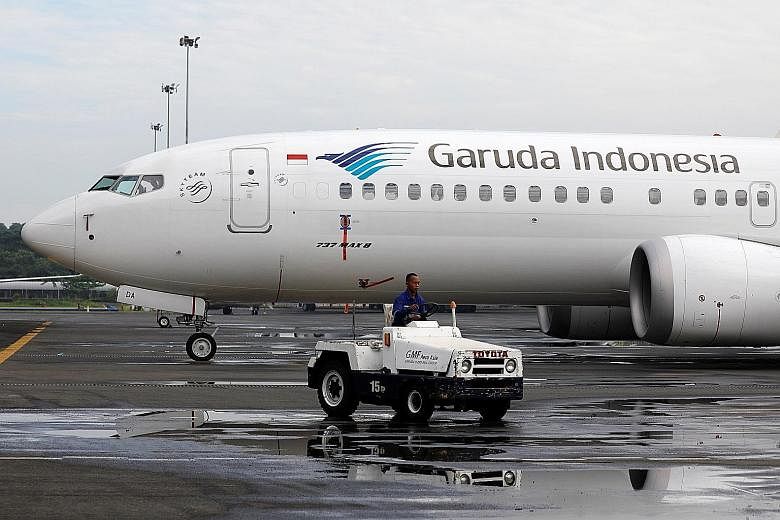 A Garuda Boeing 737 Max 8 parked at the Garuda maintenance facility at the Soekarno-Hatta airport near Jakarta last week. The Indonesian carrier's move to cancel its order could spark more cancellations from other major carriers.
