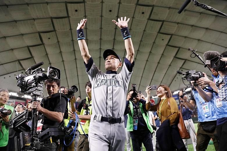 Seattle Mariners' Ichiro Suzuki waving to fans after the game against the Oakland Athletics at Tokyo Dome on Thursday. He amassed 4,367 hits in 28 seasons across two continents.