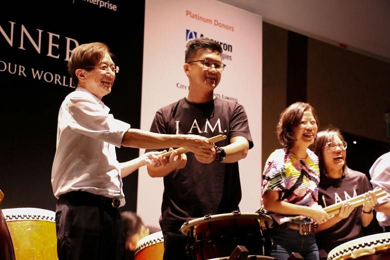 (From left) Former top public servant Philip Yeo with Philip Yeo Initiative (PYI) grant recipient Wang Junyong, founder of Mangrove Learning, and PYI steering committee member Aw Kah Peng with Ms Debra Lam, founder of Society Staples, during the Taik
