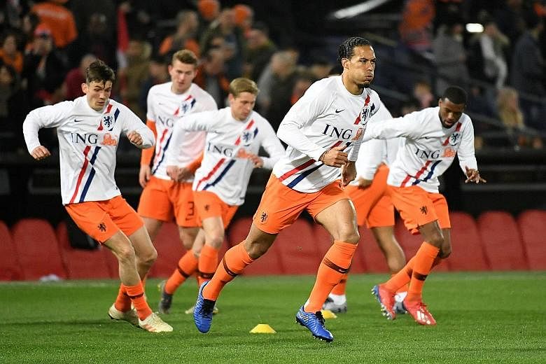 Virgil van Dijk (in front, warming up for the Belarus match on Thursday) says that while the Netherlands played well in beating Belarus 4-0, they can be a lot better against Germany today.