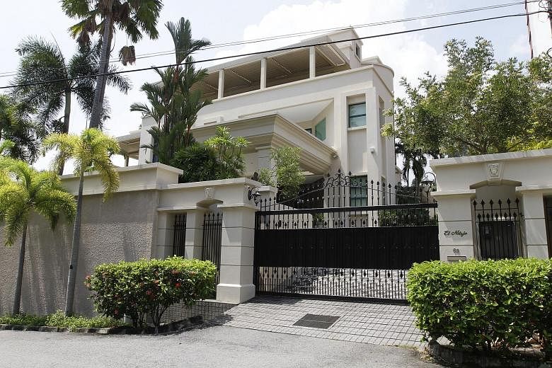 The three-storey house in Tanjung Bungah Park, owned by Jho Low's mother, was seized by the police last Thursday.