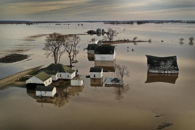 Farms surrounded by floodwater near Craig, Missouri, on Friday. Huge stretches along the Missouri River have been submerged.