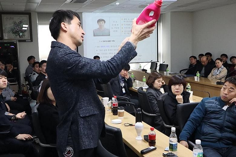 Mr Son Hae-young, an expert at detecting spycam and tapping, is seen here conducting a class for police officers on how to discover hidden cameras. His team of 11 handles 200 cases a month. His clients are mostly women in their 20s and 30s who live a