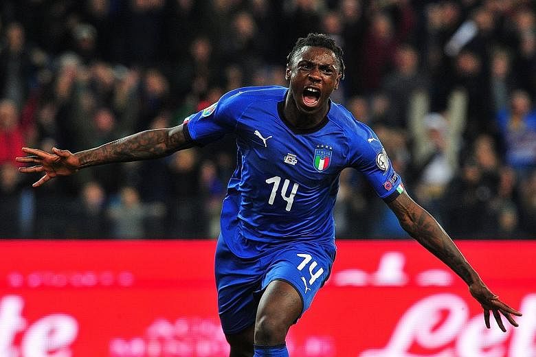 Moise Kean celebrating scoring Italy's second goal against Finland on Saturday. Like Mario Balotelli, the 19-year-old is born to African parents and as Cristiano Ronaldo's clubmate, is one of Juventus' brightest young talents.