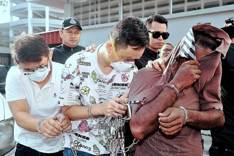 The three men - two directors and a lorry driver of a used tyre-processing company - pleaded not guilty to the charges in the Sessions Court in Johor Baru yesterday