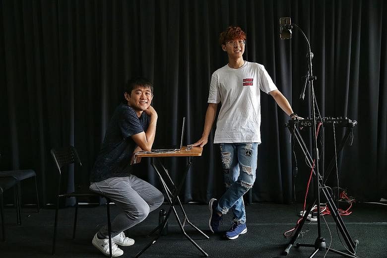 Toy Factory Productions' associate artistic director Stanley Seah (far left) believes busking should be appreciated as an art form, so he roped in university student and busker Lee Yee Kien (left) to put on the one-man show.