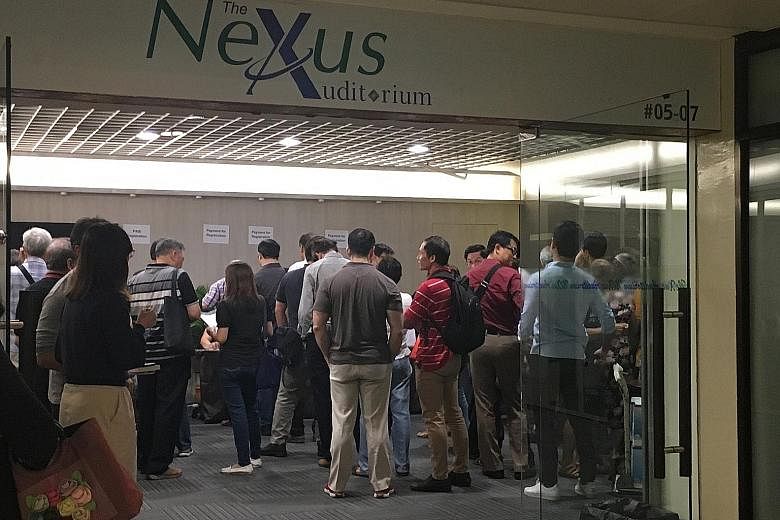 A meeting organised by the Securities Investors Association Singapore (Sias) for Hyflux perpetual securities and preference shareholders last month. Investors facing huge losses want to know how the purchase price of "zero dollars" that national wate