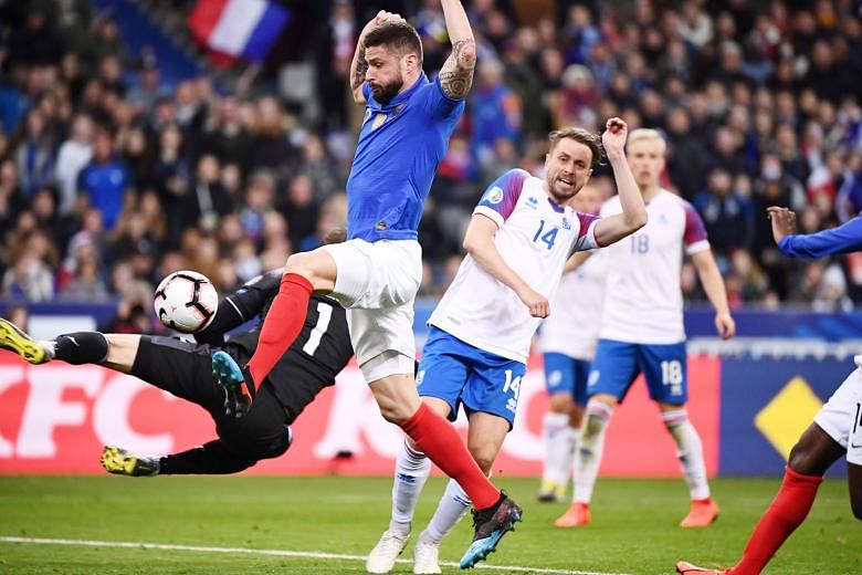 France's Olivier Giroud scoring against Iceland during the 4-0 win in their Euro 2020 qualifying match on Monday. The goal moved him to third place on the list of France's all-time top scorers on 35 goals, one ahead of David Trezeguet. Giroud now tra