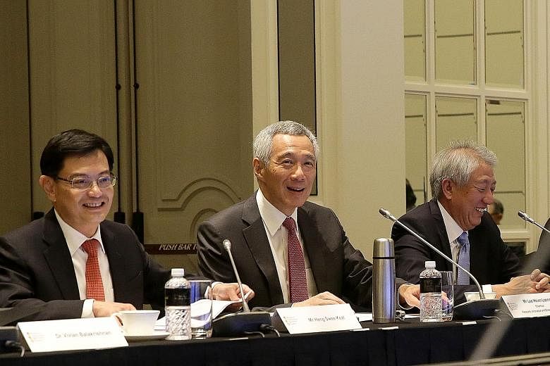 (From left) Finance Minister Heng Swee Keat, Prime Minister Lee Hsien Loong and Deputy Prime Minister Teo Chee Hean at the Research, Innovation and Enterprise Council meeting yesterday, where PM Lee stressed the need to maintain a balance between bas