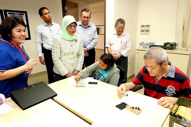 President Halimah Yacob visited the Thye Hua Kwan Home for Disabled at Sembawang yesterday and interacted with the residents aged between 16 and 55. Most of them are on long-term residential care and have been diagnosed with intellectual disabilities