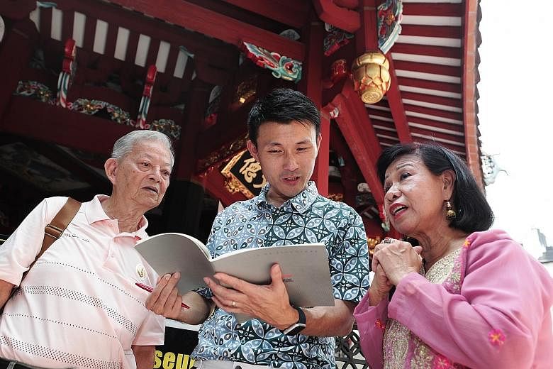 Retired clerk Ang Beng Thong, his wife Yee Mei Lin and Senior Parliamentary Secretary Baey Yam Keng at the launch of the new Maritime Heritage Trail yesterday. The trail starts at the Thian Hock Keng Temple and ends at the Malay Heritage Centre.