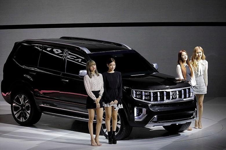 Kia showcased three concept cars - Mohave Masterpiece (above, with South Korean girl group Blackpink), SP Signature and Imagine - to support its ambition to dominate the sport utility vehicle segment.