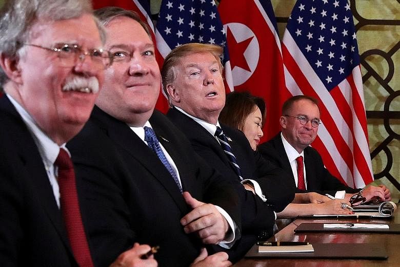 President Donald Trump with (from left) White House national security adviser John Bolton and Secretary of State Mike Pompeo at the talks with North Korea's leader Kim Jong Un in Hanoi on Feb 28, which broke down.