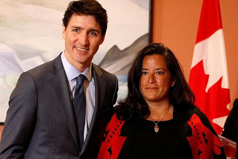 Canada's Prime Minister Justin Trudeau with Ms Jody Wilson-Raybould in a January photo before she quit her Cabinet post.