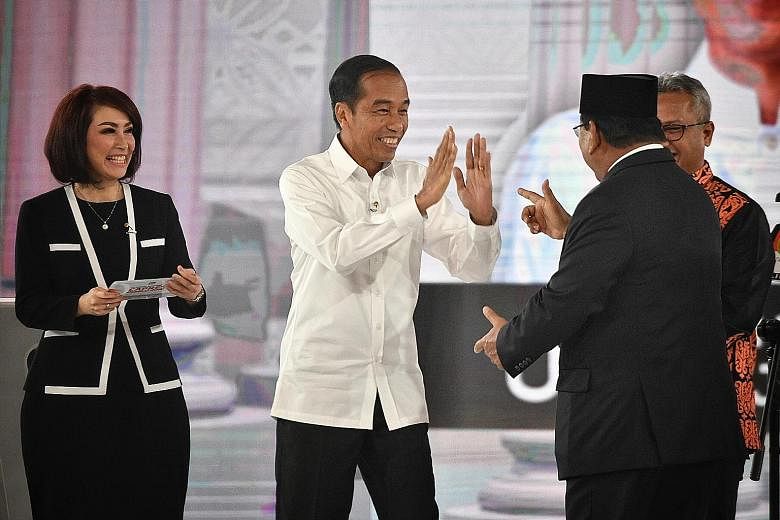 President Joko Widodo and his rival Prabowo Subianto engaging in a lively debate last night ahead of the April 17 elections. Mr Prabowo (above) even quoted Greek historian Thucydides to emphasise his desire for a strong military.