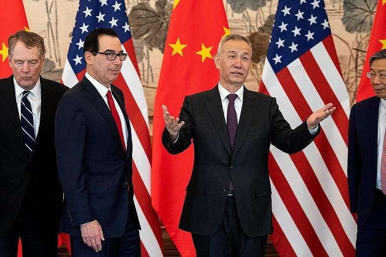 (From right) Chinese Vice-Premier Liu He with US Treasury Secretary Steven Mnuchin and US Trade Representative Robert Lighthizer at Diaoyutai State Guesthouse in Beijing last Friday. Mr Liu will lead a delegation to Washington on Wednesday to continu