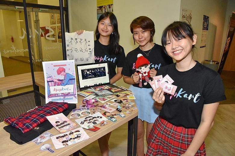 (From left) Ms Janessa Sim, Ms Moh Moh San and Ms Vera Sun, who are co-founders of KpopKart - an online marketplace where fans can buy and sell handmade products - with a selection of fan-made merchandise. Their start-up is one of 10 that have gone t