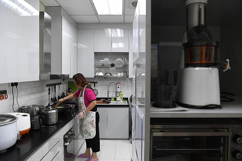 Madam Lim Chow Tee, 61, is in charge of the kitchen at MapleBear's Toa Payoh North centre, and prepares meals for the pre-school. Each of MapleBear's 37 centres has a kitchen with one or two cooks.