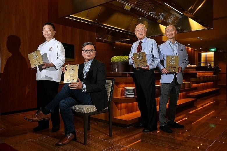 Gold award recipients at The Straits Times and Lianhe Zaobao's Best Asian Restaurants Awards (from left): master chef Chung Lap Fai of Hua Ting Restaurant; Chinese executive chef Cheung Siu Kong of Summer Pavilion; group operation manager Jimmy Leung