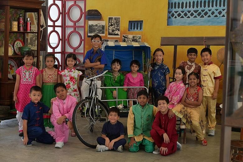 A file photo of pupils in various ethnic costumes in celebration of Singapore's diversity on Racial Harmony Day. The secularity Singapore adopts strives in every way possible to achieve racial and religious harmony. ST PHOTO: DESMOND FOO