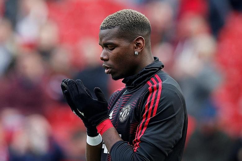 Paul Pogba praying before the EPL match against Watford last Saturday. He has regained his influence in the team since Ole Gunnar Solskjaer took charge in December.