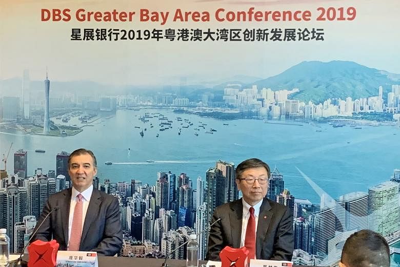 DBS' Hong Kong CEO Sebastian Paredes (far left) and China CEO Neil Ge at a press briefing after the inaugural Greater Bay Area Conference in Shenzhen yesterday. The Greater Bay Area is one of DBS' four growth engines in China.