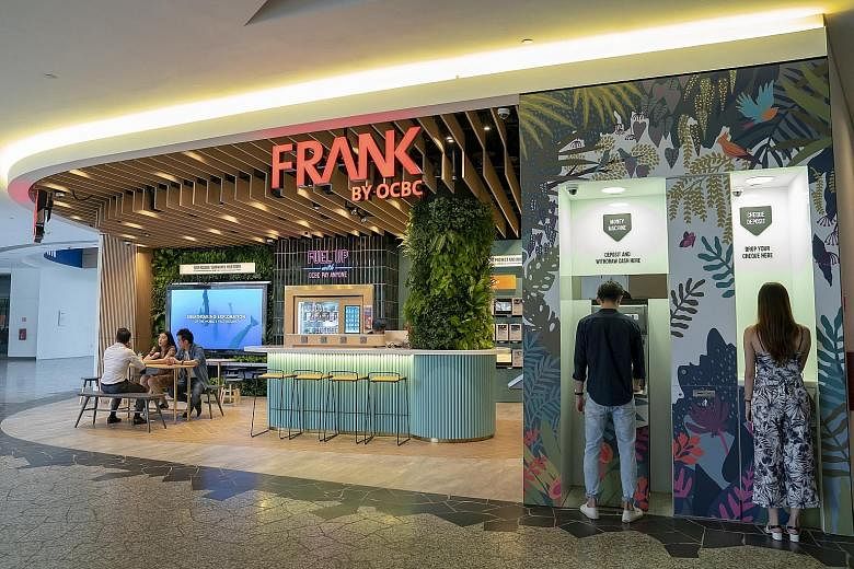 The Frank by OCBC Store in NUS' Stephen Riady Centre, University Town, is an open-concept bank branch that aims to upend the traditional image of a bank.