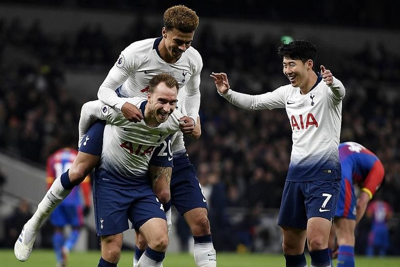 Christian Eriksen (carrying Dele Alli) and Son Heung-min scored the goals in Tottenham's 2-0 win over Crystal Palace on Wednesday.