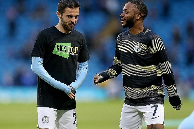 Manchester City striker Raheem Sterling, with teammate Bernardo Silva, has been often criticised since his acrimonious transfer from Liverpool in 2015.