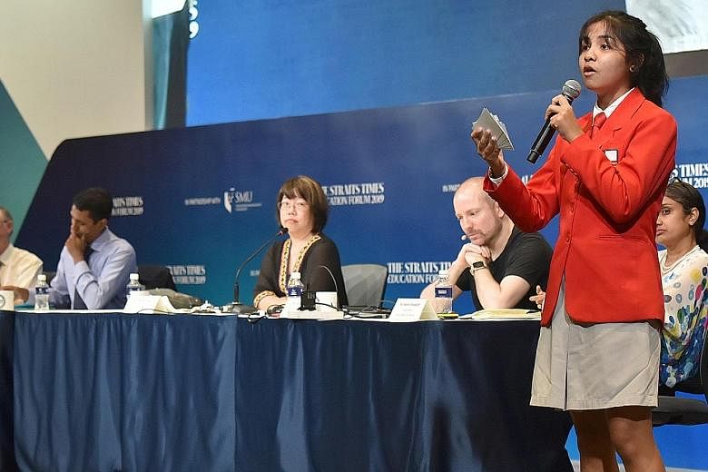 National Junior College student Eliora Joseph speaking during the debate on entrepreneurship at The Straits Times Education Forum yesterday. "Companies are profit-driven and will prioritise revenue over more important things like privacy," she said.
