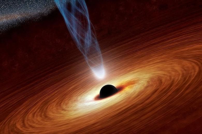 A massive black hole that is estimated to be several million to billion times the mass of the sun is seen in this undated Nasa artist's concept illustration.