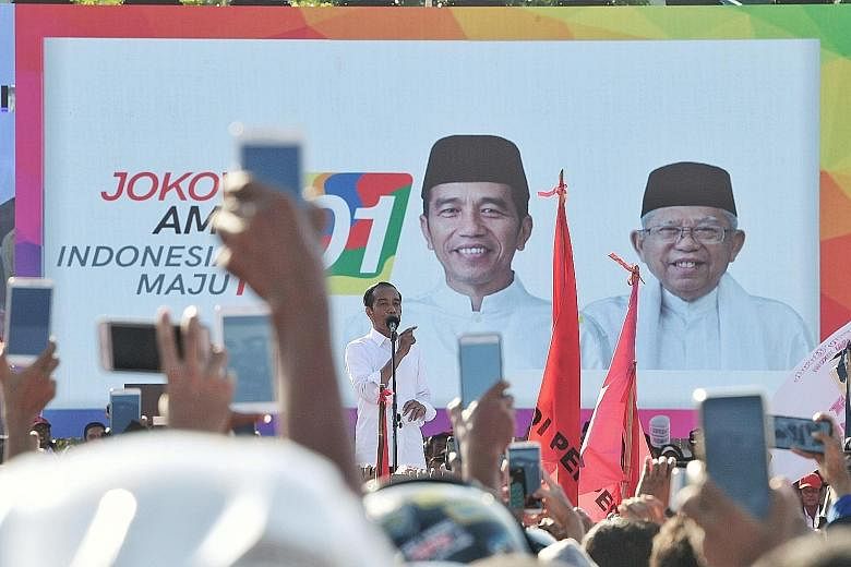 Indonesian President Joko Widodo making a point during his rally yesterday in Batam. He hoped the islanders will give him and his running mate Ma'ruf Amin at least 70 per cent of the votes.